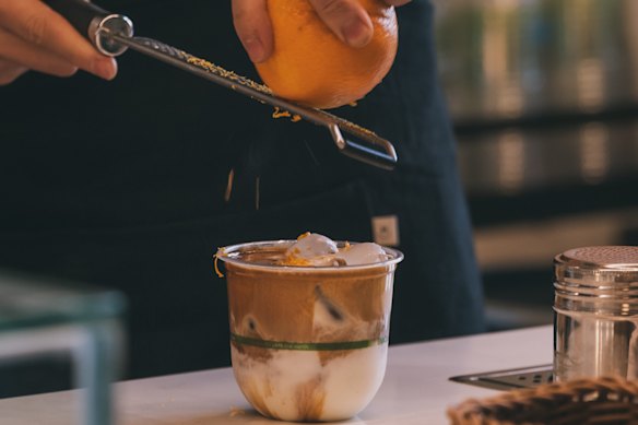 Tone Coffee’s “tiger bomb” coffee featuring fresh orange zest.