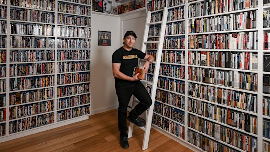 “The idea that something could be lost to time worries me”: Leslie Haworth among the 4,500 DVDs in his collection.