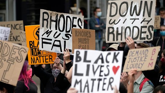 housands demonstrate outside the University of Oxford's Oriel College, demanding the removal of statue of Cecil Rhodes.
