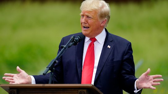 Wall push continues: former US president Donald Trump on a visit to an unfinished section of his border wall in Pharr, Texas, this week. 