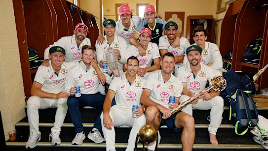 The Australian team in the dressing rooms after their series win against India.