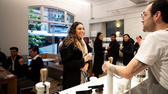 Joao Pimentel serves a customer at Industry Beans in Sydney’s CBD.