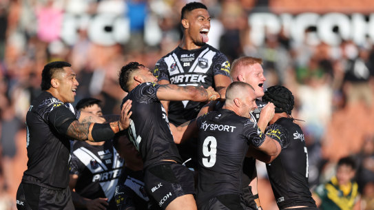 The Kiwis celebrate a try during their 30-0 defeat of Australia in the Pacific Championships final.