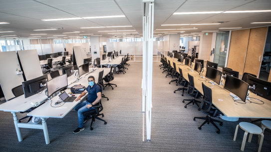 NAB employee Sandip Kumar in one of the bank’s very empty CBD offices on Tuesday. 