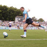 Will Harrison has a shot at goal against the Western Force. 