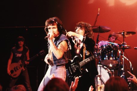 Bon Scott fronts AC/DC in Hollywood in 1977 as lead guitarist  Angus Young finds an alternative use for his school tie.