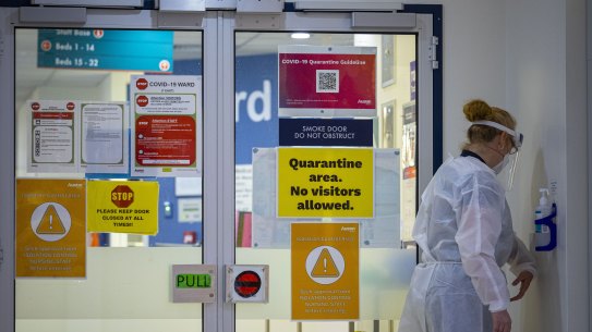 A staff member on the Austin hospital’s COVID ward.