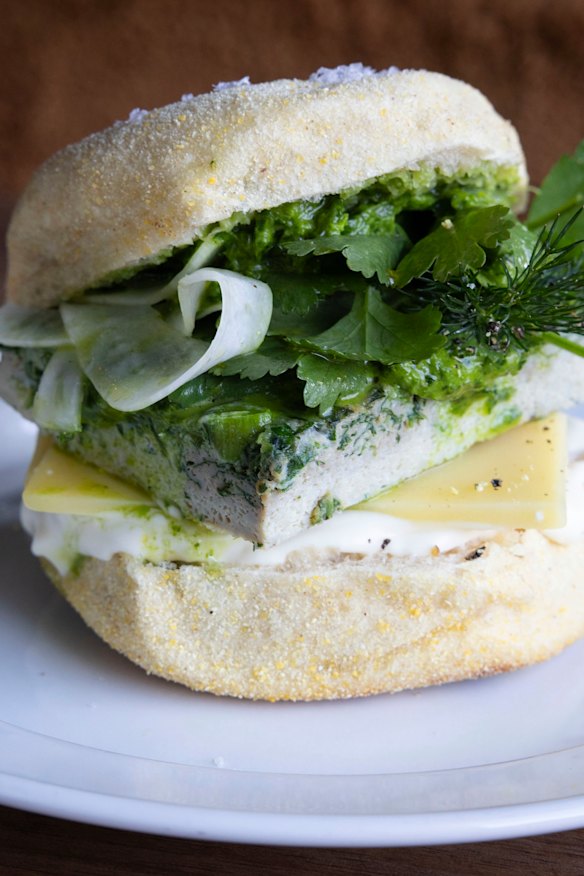Morning roll with egg, Comte cheese and shallot-coriander salsa.