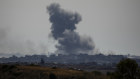 Smoke rises from an Israeli strike on Gaza. 