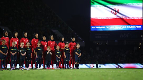 Iran line up for the national anthem before Thursday’s 2-0 Olympic qualifying loss to Australia.
