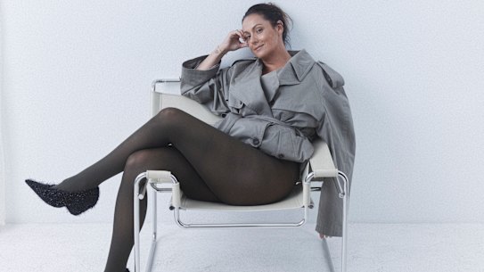 Balenciaga trench coat 
from David Jones. Trasparenze tights from Starts With Legs. Camilla and Marc “Adara” pumps.