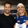 Jimmy Bartel presents Bailey Smith with his Geelong jumper.
