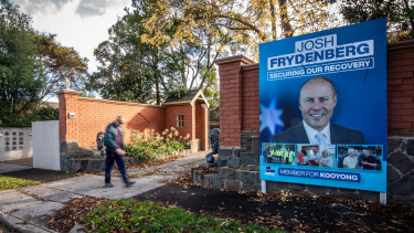 A large Josh Frydenberg campaign poster in the front yard of the home of AAT deputy president Karen Synon on Tuesday.