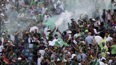 Pakistan fans celebrate their win.