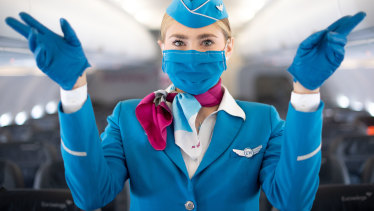 Airlines are having to reduce passenger numbers on international flights in order to fit within the federal government's cap.