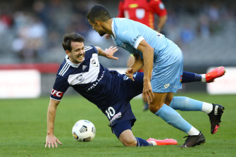 Victory’s Robbie Kruse is challenged during Saturday night’s big loss.