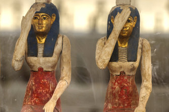 Some of the artefacts unearthed in Saqqara, Egypt, on display on Monday.
