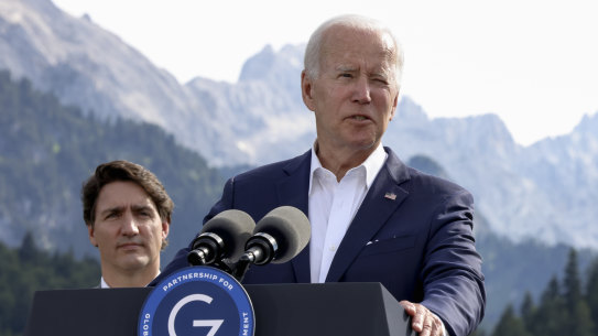 US President Joe Biden speaks at the  G7 summit in Bavaria on Sunday as  Canadian Prime Minister Justin Trudeau is looks on.