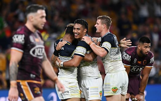 Darius Boyd's (left) final NRL game, against the Cowboys, ends in defeat.