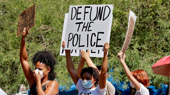 Protesters rally on June 3 in Phoenix, Arizona, demanding the city council defund the city's police department. 