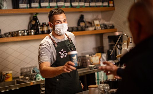 Nathan Salvalaggio serves a customer at Werribee's Wolf of Watton.