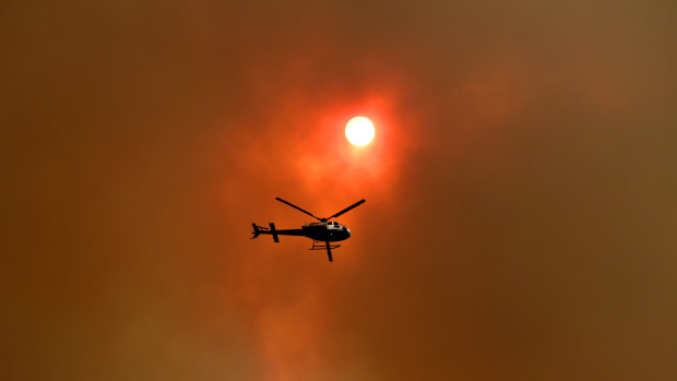 A total fire ban is in place in Sydney and across the state for Friday with the death toll from the NSW bushfires climbing to four.