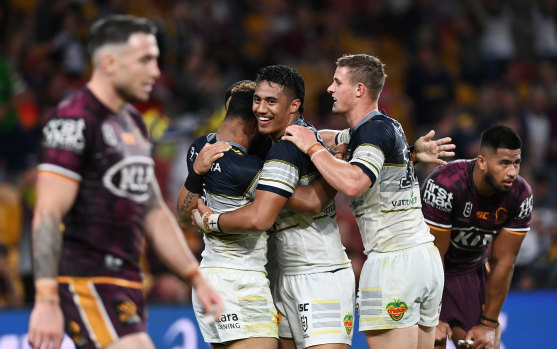 Darius Boyd's (left) final NRL game, against the Cowboys, ends in defeat.