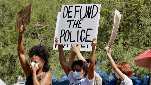 Protesters rally on June 3 in Phoenix, Arizona, demanding the city council defund the city's police department. 