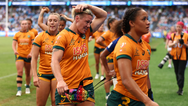 Australia leave the field after their 10-5 quarter-final defeat to France at the Sydney Sevens. 
