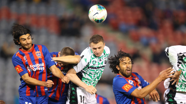 Using his head: Besart Berisha gets the best of an aerial contest for Western United.