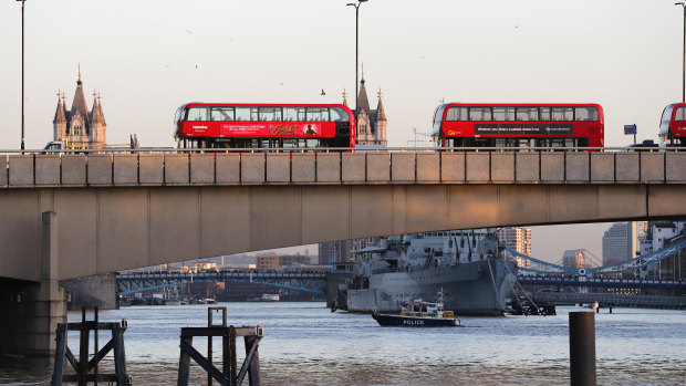 Abandoned buses parked on London Bridge.