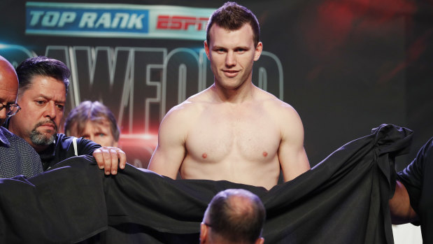 Modesty: A sheet had to cover up Horn after he was forced to take off his underwear while trying to make weight.