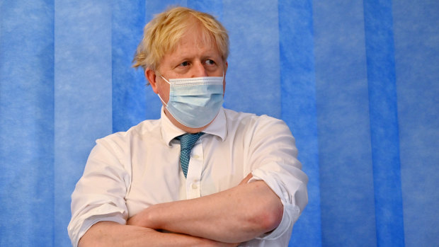 On the defence: Prime Minister Boris Johnson visits a hospital on Thursday.