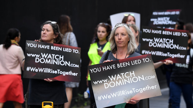 Animal rights protesters took to the streets of Sydney, carrying placards directing people to watch Dominion.