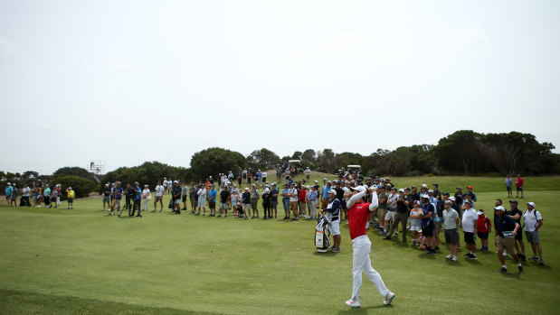 Full swing: Australia’s Min Woo Lee plays his second shot on the second hole during day four.