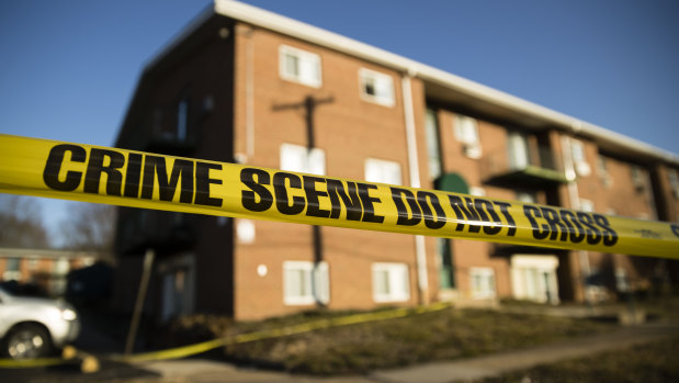 Crime scene tape surrounds the Robert Morris Apartments in Morrisville. 