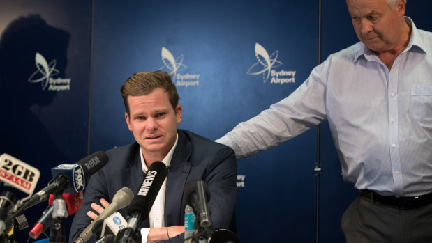 Former Australian cricket captain Steve Smith, flanked by his father Peter, weeps as he addresses media in March after the ball-tampering scandal.