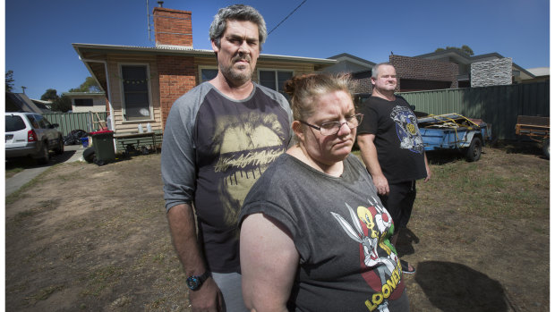 Ronald Lyons, Christine Lyons and Peter Arthur outside their home in Kangaroo Flat.