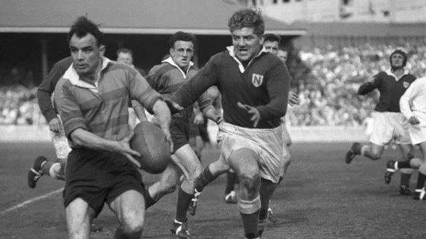 South Sydney great Clive Churchill takes on the Newtown defence during the 1954 grand final.