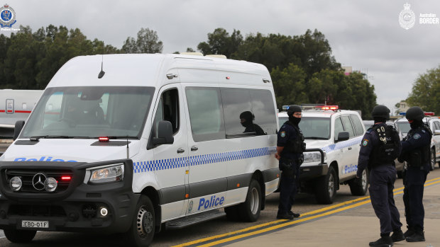 A heavy police convoy escorted Sam Ibrahim to a waiting charter flight. 