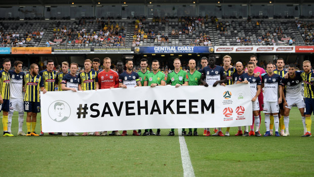 Central Coast and Melbourne Victory players show their support.