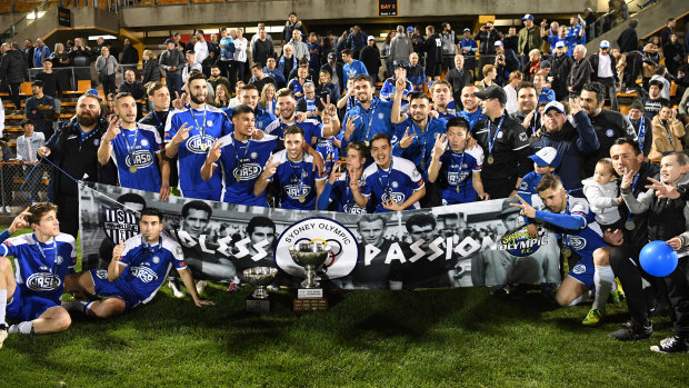 Sydney Olympic celebrate their NSW National Premier League final victory over APIA-Leichhardt.