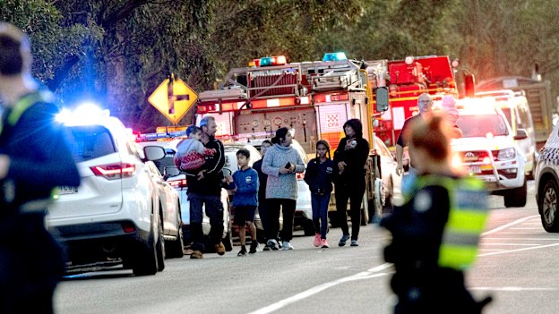 The scene became chaotic as rescuers and families arrived to help the children.