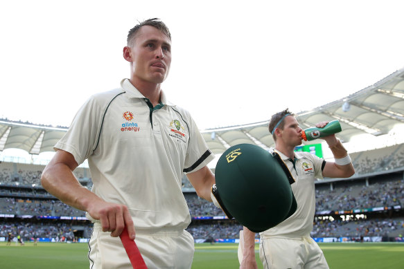 Marnus  Labuschagne, left, and Steve Smith leave the pitch during day one of the first Test.
