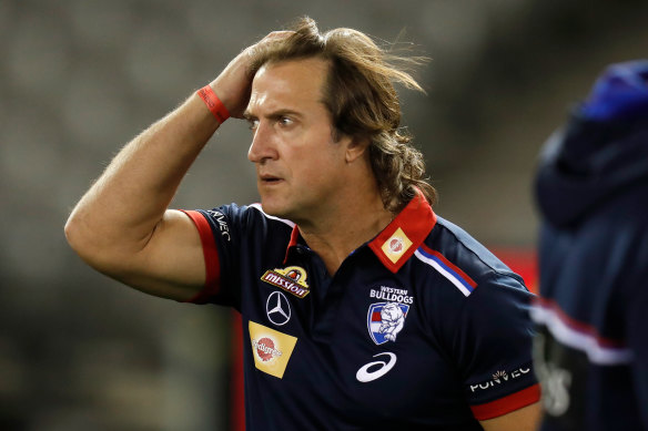 Luke Beveridge says the AFL should have consulted more widely before changing the interpretation of holding the ball.