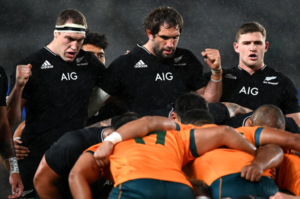 Brodie Retallick (left) and Samuel Whitelock (centre) taking on the Wallabies last year.