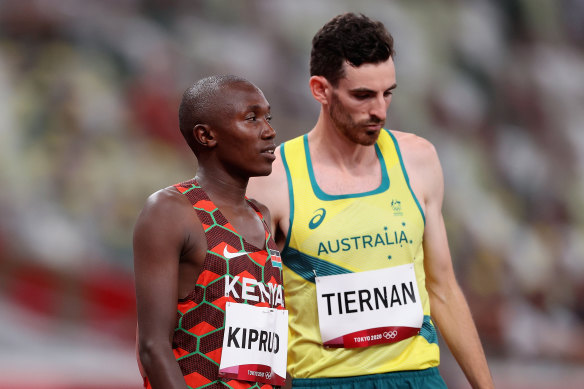 Australia’s Patrick Tiernan and Kenyan athlete Rhonex Kipruto before the race.