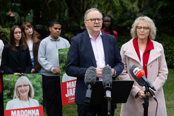 Prime Minister Anthony Albanese with Brisbane candidate Madonna Jarrett on Saturday.