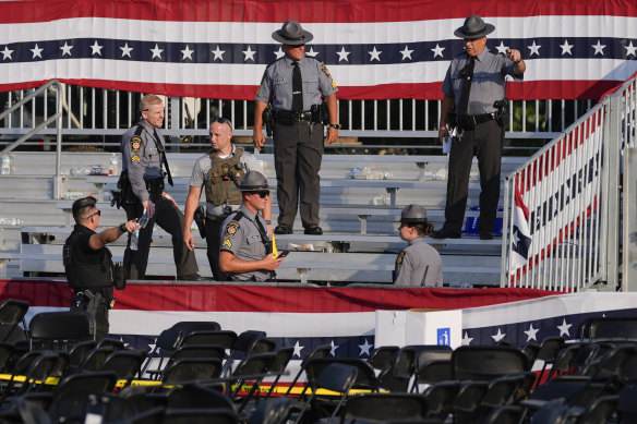 Law enforcement officers work at the campaign rally site for Republican presidential candidate Donald Trump.