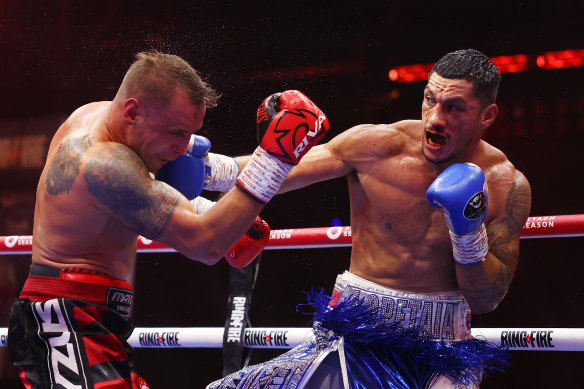 Jai Opetaia punches Mairis Briedis during the IBF World Cruiserweight title fight.